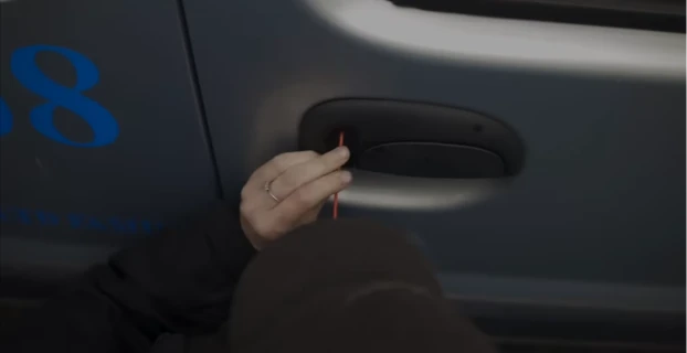 Locksmith opening a locked car door in Tuscaloosa