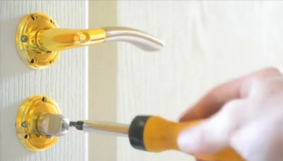 Deadbolt installation on a residential door in Tuscaloosa