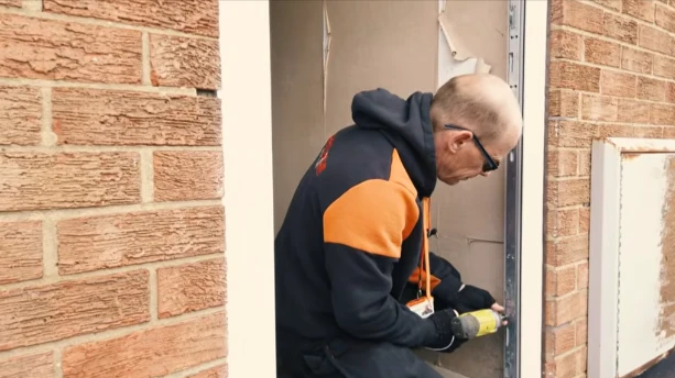 Locksmith performing precision drilling on a safe in Tuscaloosa